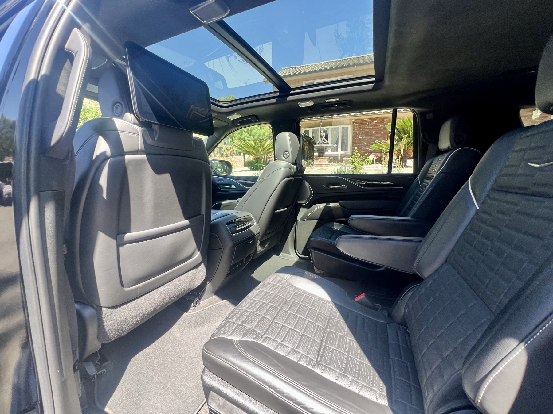 Quilted leather interior of a Cadillac Escalade luxury SUV used for private Los Angeles tours from Anaheim