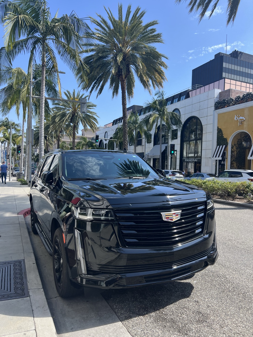 Black Cadillac Escalade on Rodeo Drive in Beverly Hills during a private Los Angeles tour from Anaheim